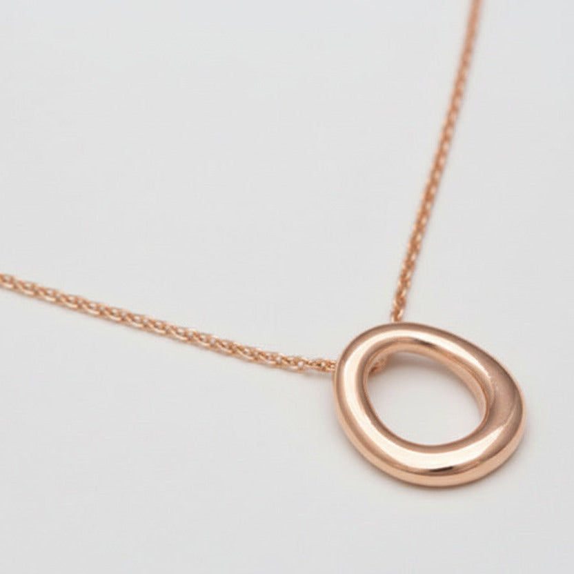 Elegant stylish Hug necklace pendant. Letter O .Rose gold.