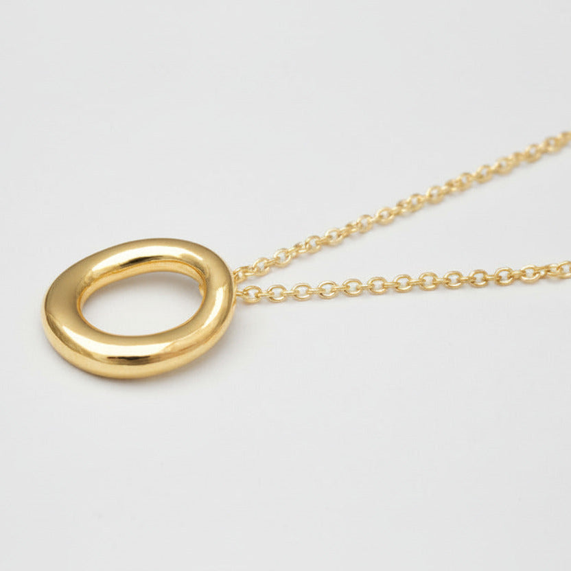 Elegant stylish Hug necklace pendant. Letter O .Yellow gold.