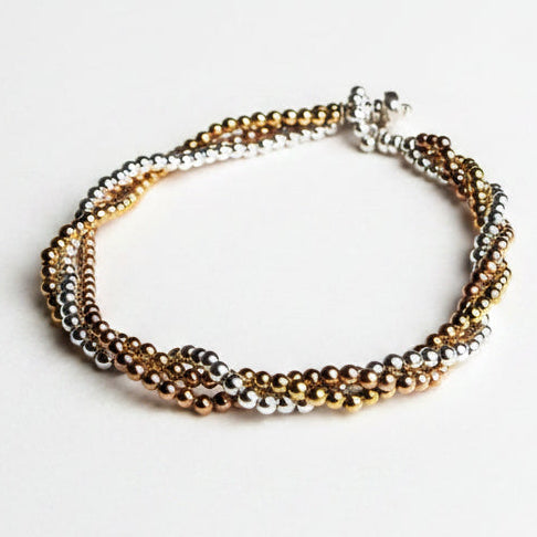 Twisted or loose sterling silver and 18 carat rose and yellow gold vermeil bead bracelet for her