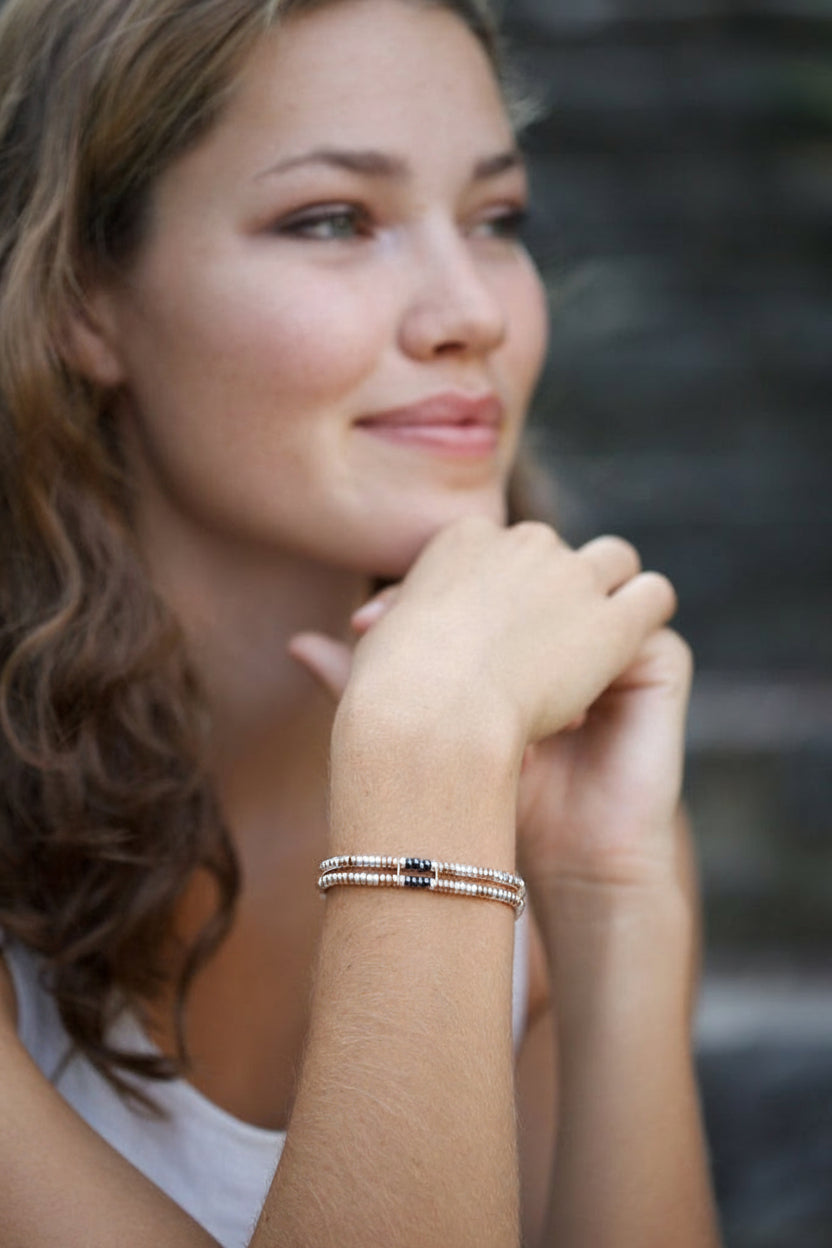 Sterling silver and 18 carat rose gold  vermeil beaded double-strand bracelet. 